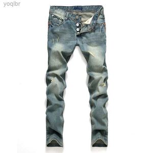Jeans masculin nouveau jeans de trou de mode de denim pour hommes longs pantalons en détresse hétéros.