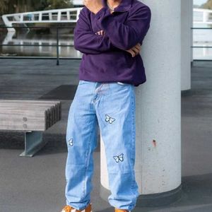 Jeans masculin New Hommes broderie papillon élégant jeans en vrac pour hommes de bonne qualité pantalon de jean décontracté pantalon mâle y240507