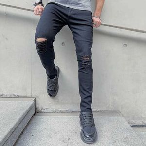 Herenjeans nieuwe mannen hiphopstijl gescheurd skinny jeans mannen stijlvolle slanke gaten potlood denim broek y240507