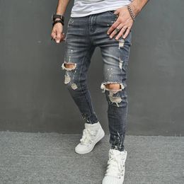 Jeans pour hommes Nouveaux jeans crayon serrés coupe ouverte pour hommes vêtements de rue trous hip-hop pour hommes pantalon en denim ultra-mince élastique 231109