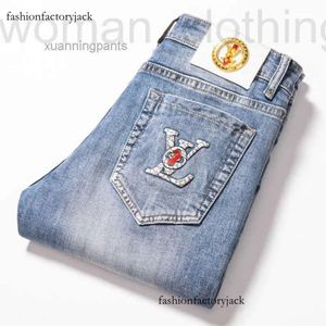 Jeans pour hommes nouvel été couleur claire jean hommes coupe ajustée pied élastique étiquette de mode pantalon FEBA