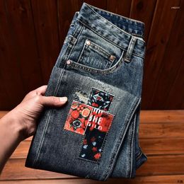 Jeans pour hommes en tissu de pâte de pâte de pâte de rue Motorcycle de rue Slim Fit Skinny Pantalon Ripped Patch Stretch Wasted Pantums