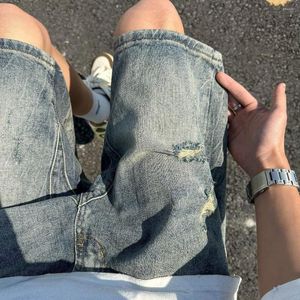 Jeans pour hommes Shorts en denim perforé pour l'été 2023 Pantalon lavé de style américain Lâche Tendance Jambe droite Capris