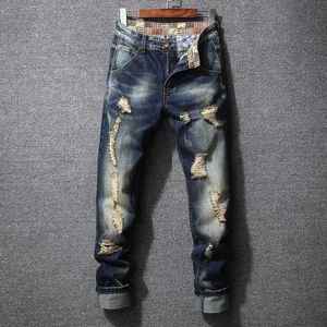 Personnalité en jeans pour hommes Ripped Men Denim Jeans Nouveau pantalon de marque hip hop européen et américain Hip Hop Y240507