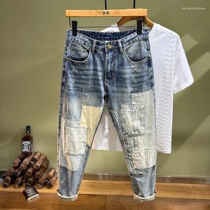 Jeans masculins à broderie personnalisée Vandalisme patchs créateurs de mode épissant un pantalon maigre de streetwear