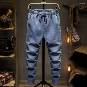 Jeans pour hommes grande taille 7XL 8XL 9XL 10XL printemps mode décontracté survêtement Harem Denim pantalon 2 couleurs Hip Hop épissure pantalon masculin