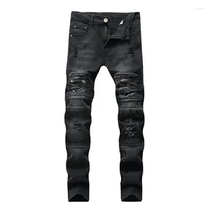 Los pantalones vaqueros de los hombres producen el agujero del dril de algodón arruinado estilo de la calle principal a juego con el blanco minimalista básico micro-delgado de moda de gran tamaño