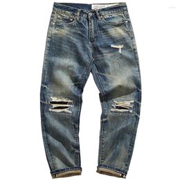 Jeans pour hommes Denim rouge hommes automne et hiver américain décontracté décadence rétro déchiré patch pantalon cône droit