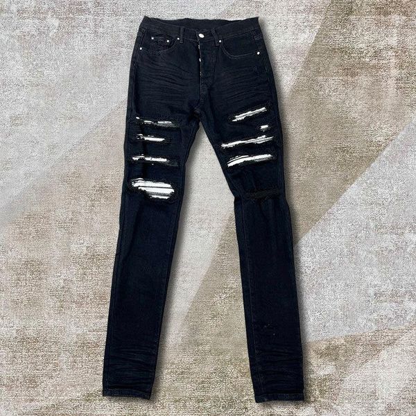 Jeans para hombres Retro Black Ripped Designer Jean Men Pant Street Hole Patchwork Noir Homme Hip Hop Punk Motocicleta Apilada