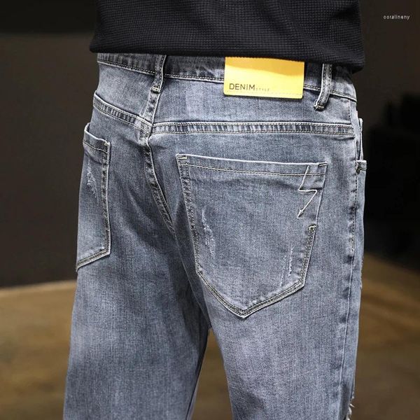 Jeans para hombres rasgados Primavera y verano Elástico Autocultivo Marca de moda Versión coreana Pantalones pitillo