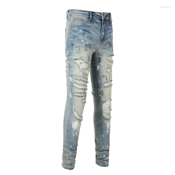 Jeans para hombres venden ropa de calle de la UE joven Slim Fit agujeros destruidos azul claro estiramiento rayado italiano goteo