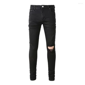 Vendedores de jeans para hombres Pantalones rasgados ajustados con agujeros en blanco desgastados negros para hombres