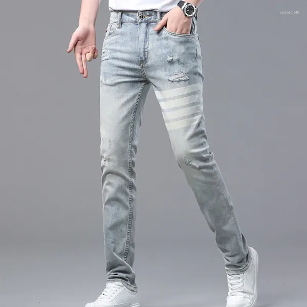 Jean pour hommes rayures simples avec couleurs contrastées hommes marque personnalité mince Jean mode européenne décontracté pantalon à la mode