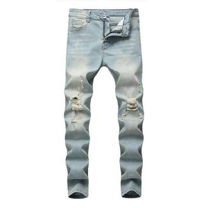 Jeans masculin style simple rétro solide trou serré en jean serre pantalon à la mode