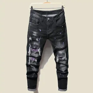 Jeans pour hommes Slim avec trous de gland déchirés et peinture élastique en aérosol couture noire pantalon de mendiant hommes concepteur pour