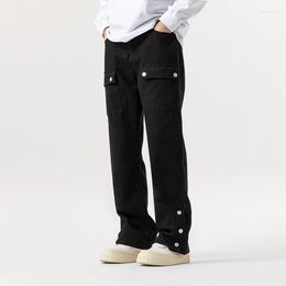 Pantalon solide en jean masculin avec des pantalons multiples de style de rue décontracté confortables pour les vêtements en plein air