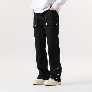 Pantalon solide en jean masculin avec des pantalons multiples de style de rue décontracté confortables pour les vêtements en plein air