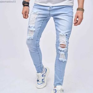 Heren jeans lente en herfstheren open jeans extreem dunne heren broek modieuze elastische gaten potlood casual jeansl2404