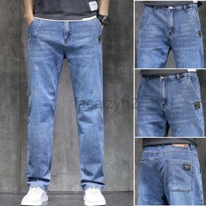 Jeans masculin printemps et automne nouveau jean masculin en baisse de grande taille de grande taille pantalon de jambe droite élastique