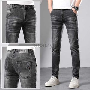 Jeans masculin printemps et automne nouveau jeans masculin tendance mode élastique slim slim small pieds pantalons jeunes jeans noirs pantalon gris plus taille pantalon