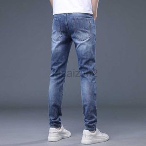 Jeans masculin printemps et été nouvel jean masculin édition édition tendance élastique slim sil petit pantalon de tube à tube jeune