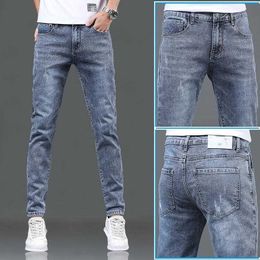 Heren jeans lente herfst slank blauw spijkerbroek goedkope cowboy wassen Koreaanse stijl tieners luxe hiphop stijlvolle denim mode skinny broek z0508