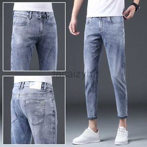 Jeans masculin printemps / été nouveau jeans masculin jeune pantalon élastique pantalon bleu clair nine pantalon de neuf points et de taille plus taille