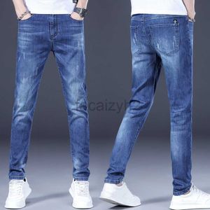 Jeans masculin printemps / été nouveau jeans masculin jeans slim fit petit pantalon de pied jeune tendance élastique pantalon denim de grande taille masculine plus pantalon taille