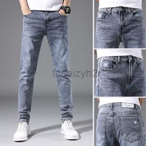 Jeans masculin printemps / été nouveau jeans masculin jeunesse slim fit petit pantalon de pieds pour hommes.