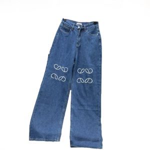 Jeans masculin Pantalon féminin de printemps nouveau classique Blue Ligne lâche lettre décontractée Broderie Couleur solide jeans Baggy