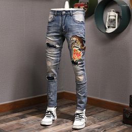 Heren jeans streetwear mode mannen retro blauw stretch slank fit vintage gescheurde luipaard patch ontwerper hiphop broek hombre