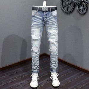 Jeans masculin streetwear mode homme rétro bleu stretch skinny fit hit en cuir déchiré pantalon de marque hip hop en cuir rapiéré hip hop