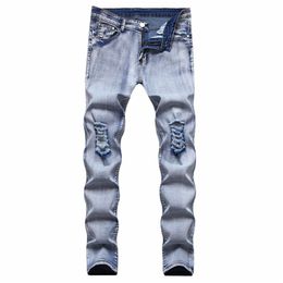 Heren jeans streetwear mannen herfst winter effen kleur slanke stretch casual midden taille gescheurd met denim rechte broek