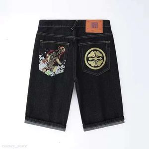 Jeans masculin d'été des jeans hommes shorts hiphop pantalon denim cerise fleur totem dragon brodé jeans à oreilles rouges lavées