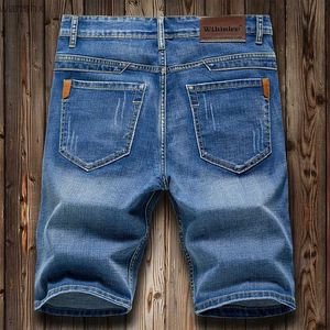 Jeans masculin short d'été pantalon denim pour hommes élastiques en bleu foncé design à la mode jeans