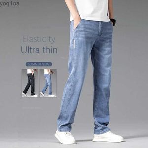Jeans masculin jeans minces minces mens en vrac pantalon droit à la mode élastique à la mode élastique Business décontracté denim décontracté