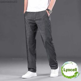 Jeans para hombres Summer delgados para hombres casuales jeans heterosexuales clásico de la cintura alta de la cintura de la cintura de la cintura de la cintura