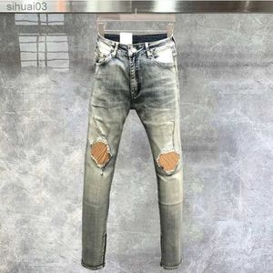 Jeans homme Pantalon fuselé pantalon de moto homme jean homme denim élastique ultra-mince bleu clair jean de pensée flexible jeans déchirés plis jeansL2403