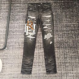 Brand de marée de jeans pour hommes à la broderie épissée du trou cassé Sinnall Skinny Man High Street