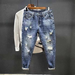 Jeans pour hommes Pantalon de cowboy déchiré pour hommes avec imprimé déchiré trous cassés pantalon graphique esthétique conique Harajuku classique Buggy Xs jean pour hommes 230830