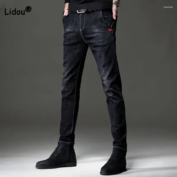 Jeans para hombres Tendencia de la cintura vintage lápiz de lavado 2023 otoño invernal de moda botón coreano pantalones elásticos ropa macho ropa