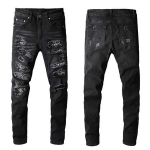 Jeans pour hommes Trendamiri Jeans noirs de haute rue européens et américains pour hommes portant des leggings à patch déchiré élastique pantalons décontractés pour hommes J240328