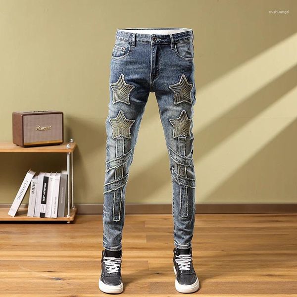 Jeans masculin à tendance tendance luxe luxe masculin patchwork slim fit tube à tube lourd pantalon motard en coton brodé