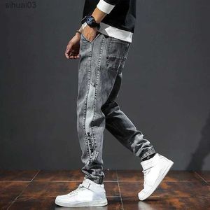 Pantalon de jean masculin Harem Mens surdimensionné en jean conique jeans pour hommes avec des poches