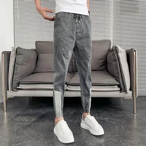 Jeans pour hommes pantalons tuyaux serrés épissés pour hommes maigres pantalons de cowboy mâles coupe slim recadrée xs mode coréenne lavé vêtements d'automne