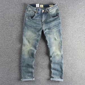 Jeans masculin vintage bleu d'eau lavage a fait de l'ancien micro embelli avec un pantalon de jeunesse élastique à tube droit ajusté