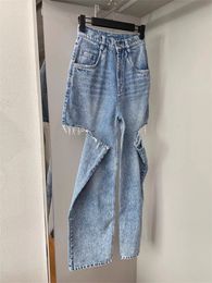 Jeans da uomo lavati blu con foro tagliato a coltello uomo donna design alla moda di alta qualità 230918