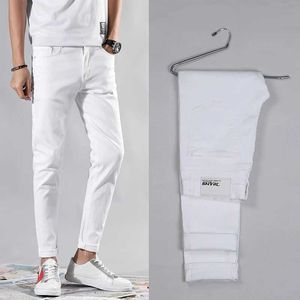 Jeans masculin blanc noir classique élastique serré jeans jeans de haute qualité jeans slim slim pantalon décontracté pour hommes coton coton crayon pantl2405
