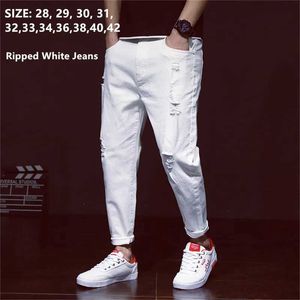 Heren jeans witte jeans mannen scheurden haremjongens denim noodlijdende zwarte broek lente zomer mannelijk 2022 plus maat 38 40 42 grote cowboybroek J231222