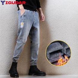 Jeans masculinos inverno calças de brim homens preto azul estiramento grosso veludo harem calças homens quentes jeans jeans casuais calças de lã masculino tamanho s-5xl 231109